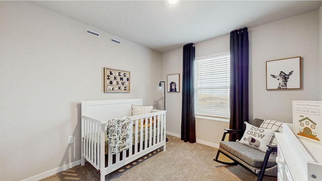 1007 Daisy Ln, Waukee, IA 50263 - carpeted bedroom with a nursery area