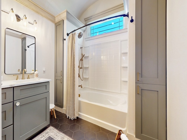 bathroom with shower / tub combo, vanity, and tile patterned floors