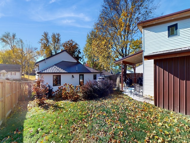 exterior space featuring a patio and a yard