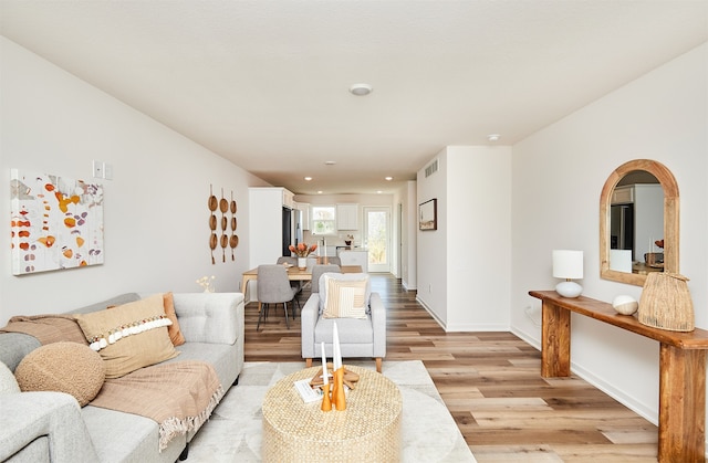 living room featuring light hardwood / wood-style floors