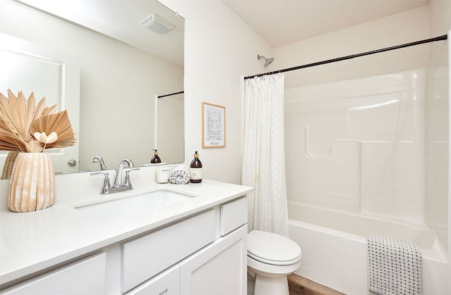 full bathroom with shower / tub combo with curtain, vanity, toilet, and wood-type flooring