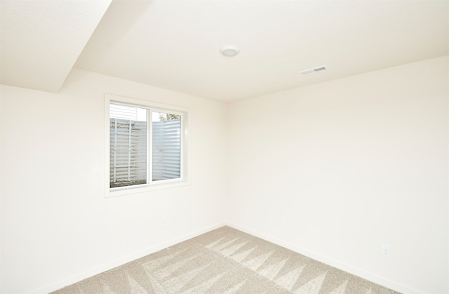 unfurnished room featuring carpet floors