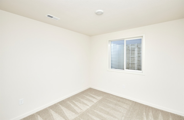 empty room featuring carpet