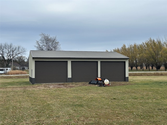 garage with a lawn