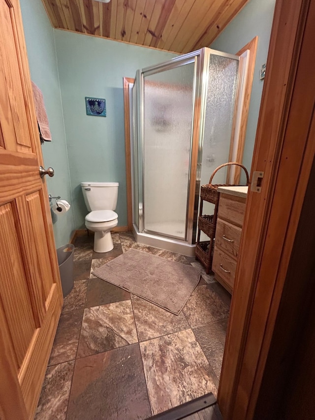 bathroom featuring toilet, wood ceiling, and walk in shower