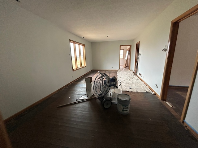 empty room featuring hardwood / wood-style flooring