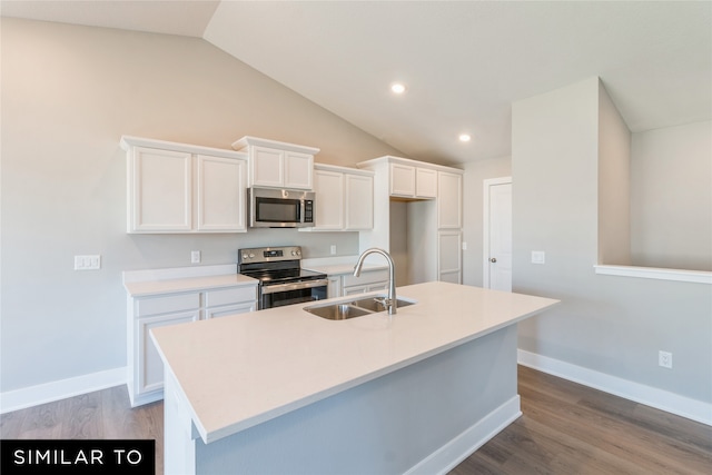 kitchen with white cabinets, light hardwood / wood-style floors, sink, and appliances with stainless steel finishes