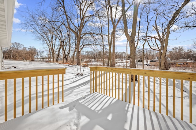 view of snow covered deck