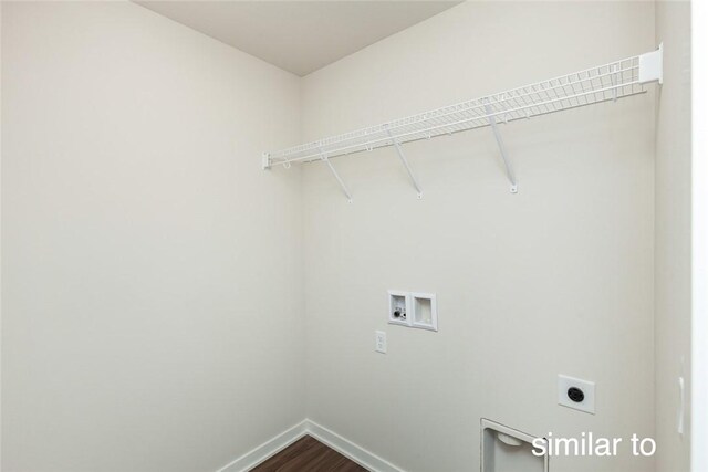 washroom with electric dryer hookup, hookup for a washing machine, and hardwood / wood-style flooring