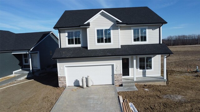 view of front of home with a garage