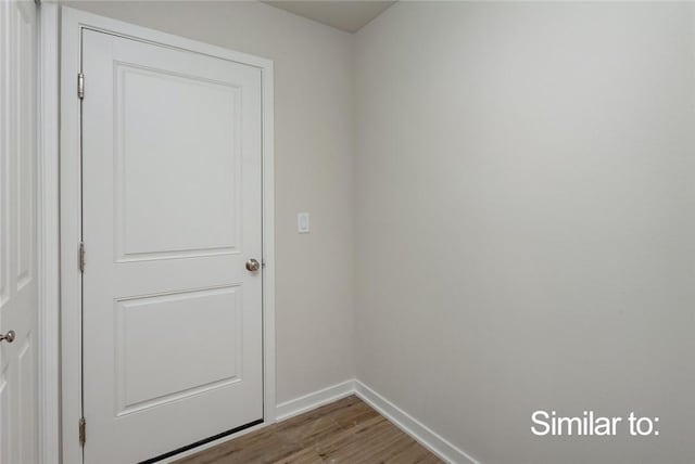 doorway to outside with hardwood / wood-style flooring