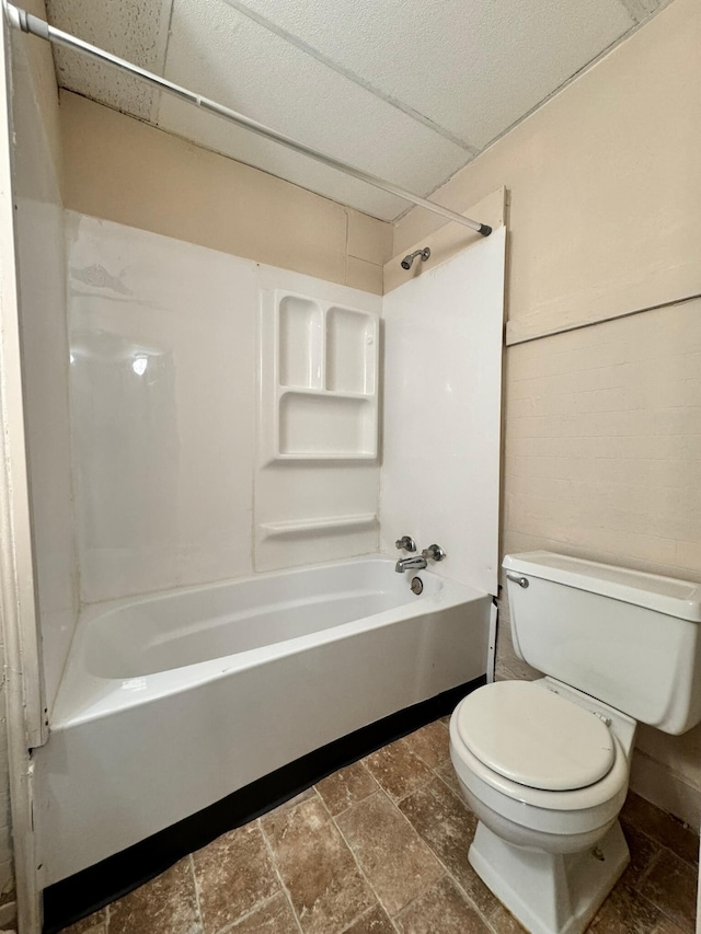 bathroom with  shower combination and toilet