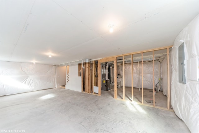 unfinished basement with heating unit