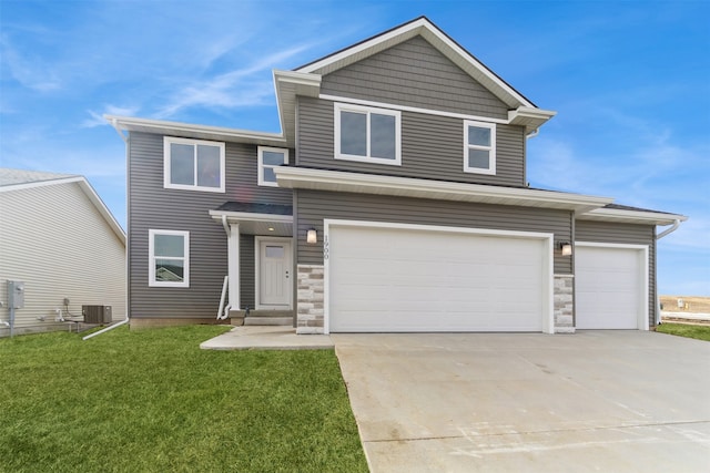 view of front of home with a garage, stone siding, driveway, and a front lawn