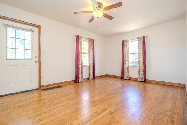 interior space with ceiling fan, a healthy amount of sunlight, and light hardwood / wood-style flooring