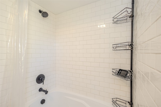 bathroom with shower / bathtub combination with curtain