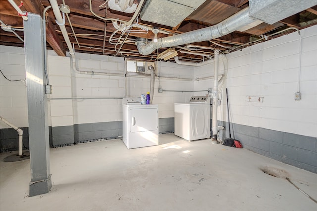 basement with washing machine and clothes dryer