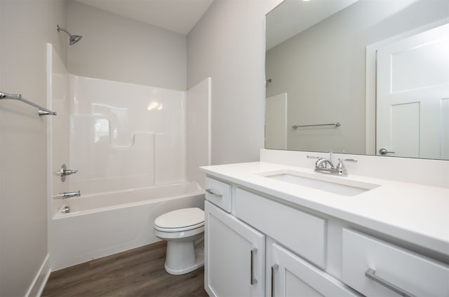 full bathroom with toilet, shower / bath combination, vanity, and wood-type flooring