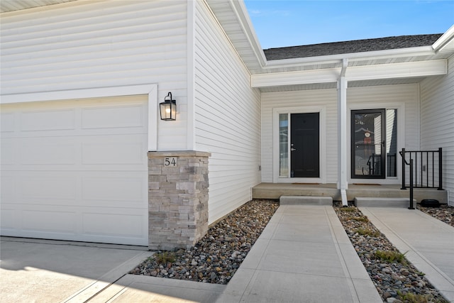 property entrance featuring a garage