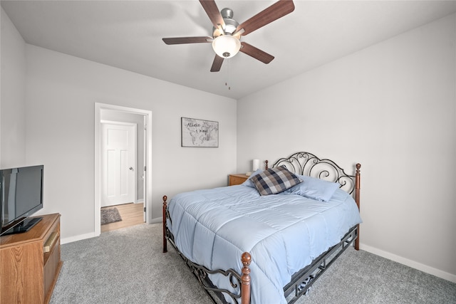 bedroom with ceiling fan and light colored carpet