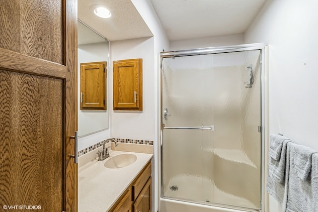 bathroom featuring vanity and a textured ceiling