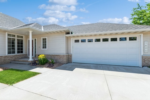 view of front of property with a garage