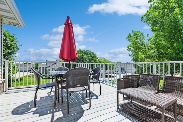 deck with outdoor dining space