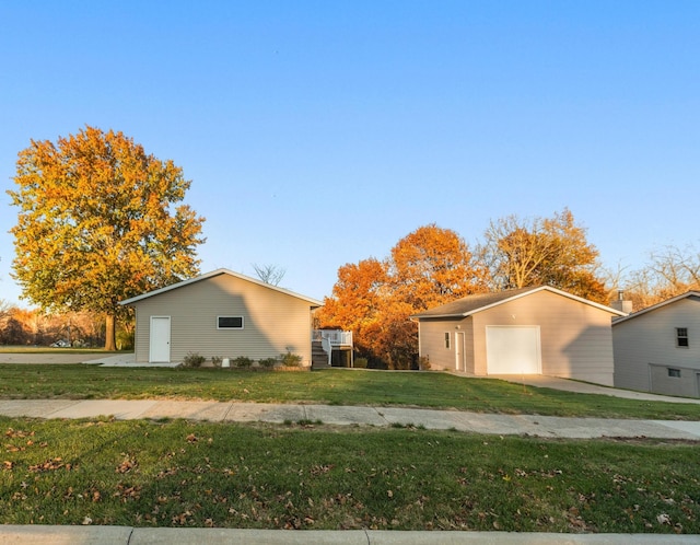 view of side of property with a yard