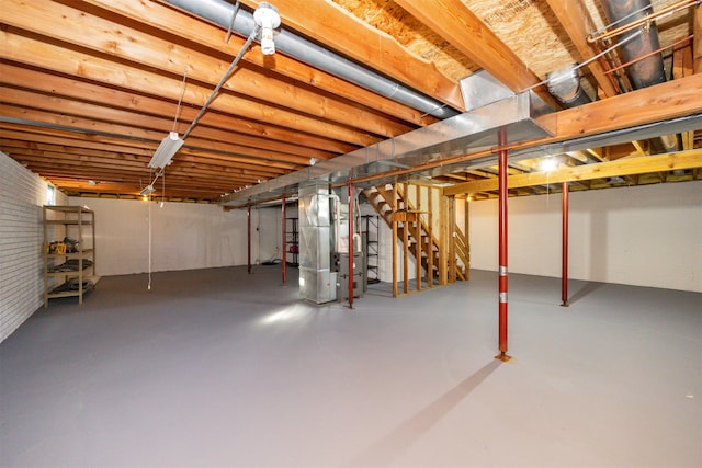 basement featuring heating unit