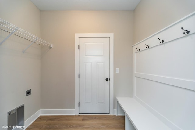 2806 22nd St SW, Altoona, IA 50009 - washroom with hookup for an electric dryer, light wood finished floors, and baseboards