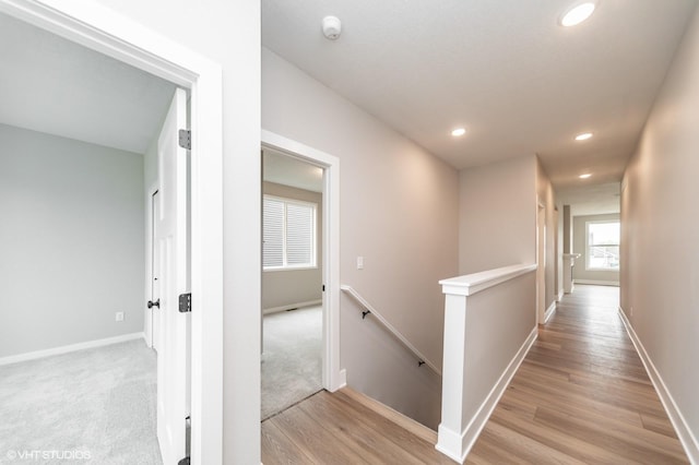 2806 22nd St SW, Altoona, IA 50009 - hallway featuring an upstairs landing, light wood-style floors, baseboards, and recessed lighting