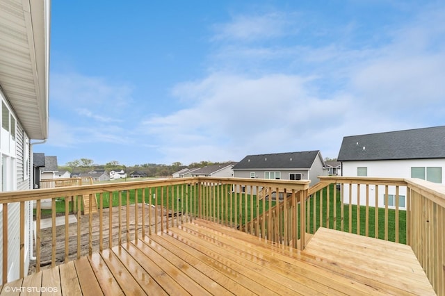2806 22nd St SW, Altoona, IA 50009 - wooden terrace featuring a residential view and a yard