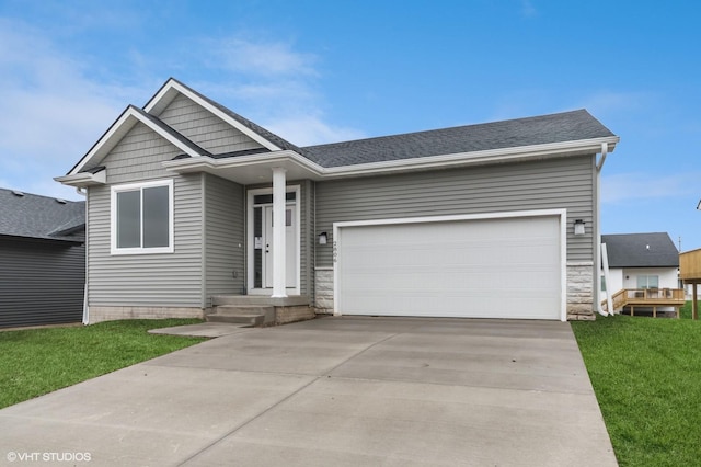 2806 22nd St SW, Altoona, IA 50009 - single story home with a garage, concrete driveway, a front lawn, and roof with shingles