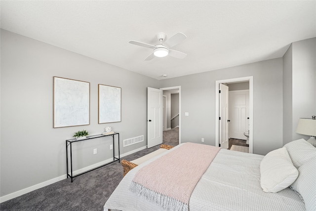 bedroom featuring ceiling fan and dark carpet