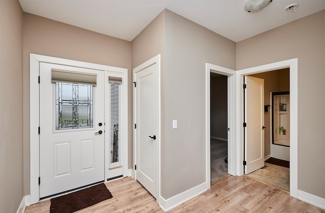 foyer featuring light hardwood / wood-style flooring