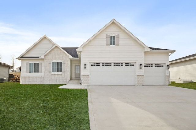 view of front facade featuring central AC unit, a garage, and a front yard