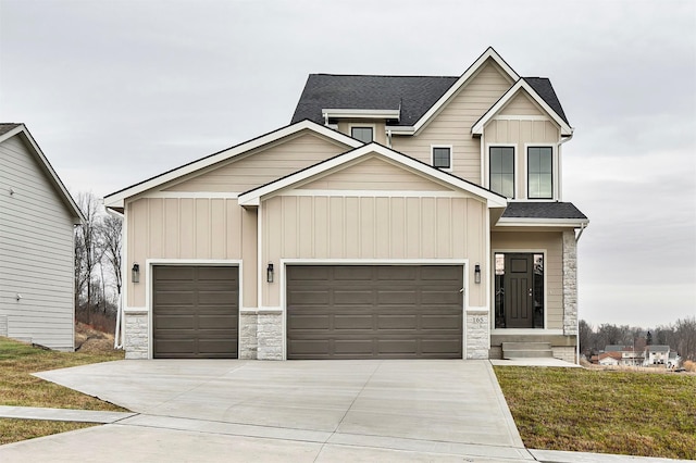 craftsman house with a garage