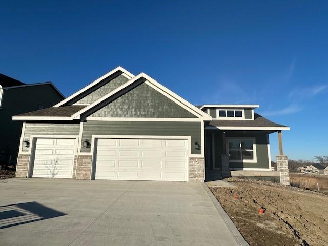 craftsman house with a garage