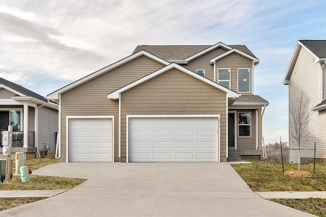 view of front of property with a garage