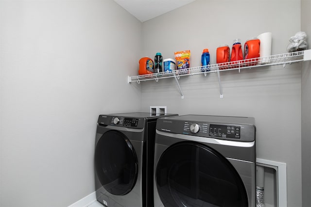 laundry area featuring washer and clothes dryer