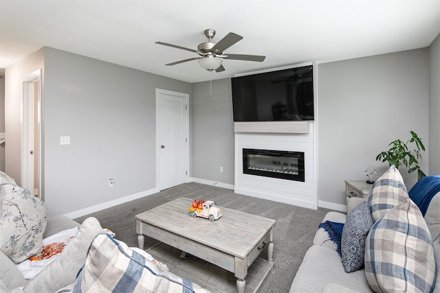 carpeted living room with ceiling fan