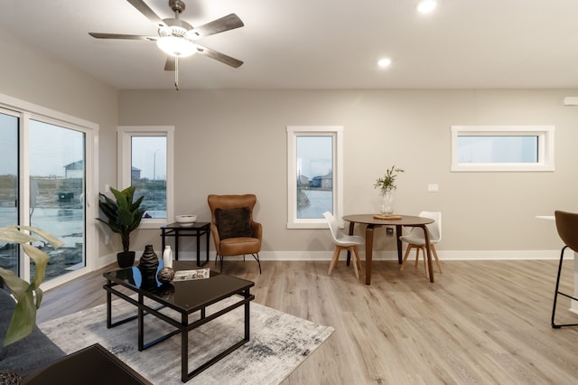 interior space featuring light wood-type flooring and ceiling fan