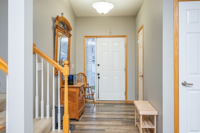 entryway with dark hardwood / wood-style floors