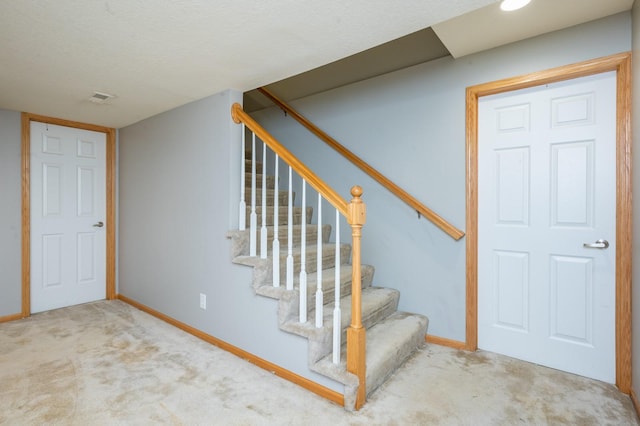 stairway with carpet flooring