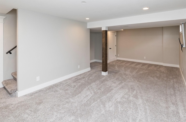6562 Center St, West Des Moines, IA 50266 - finished below grade area featuring carpet flooring, baseboards, recessed lighting, and stairs