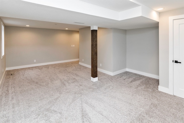 basement with light colored carpet