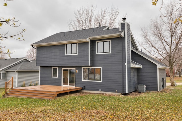 6562 Center St, West Des Moines, IA 50266 - rear view of property with a chimney, central AC unit, a deck, and a yard