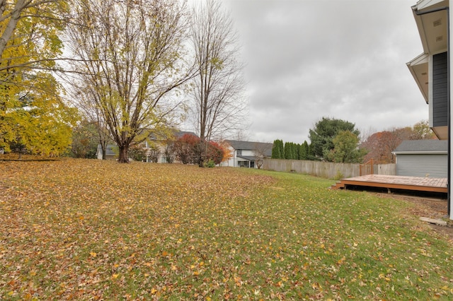 view of yard with a wooden deck