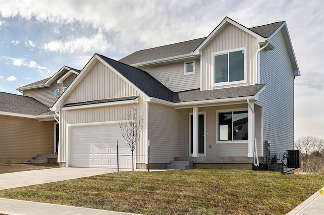 craftsman-style home with a garage, central AC, and a front yard