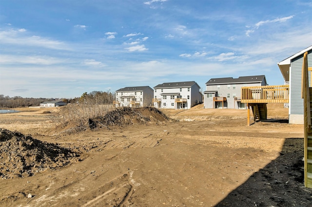 view of yard featuring a wooden deck